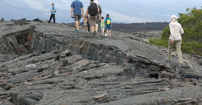 Group of travelers hiking on Fernandina Island
