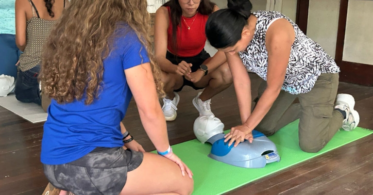 CPR demonstration done by a group of women