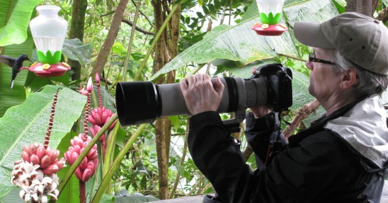 Photographing birds at the café in Cinchona