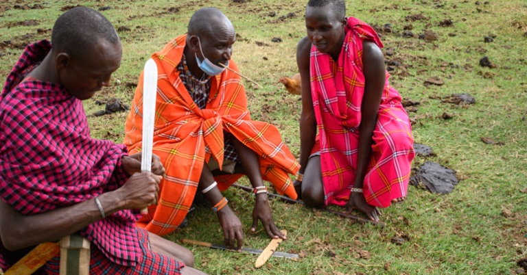 Maasai villagers making fire