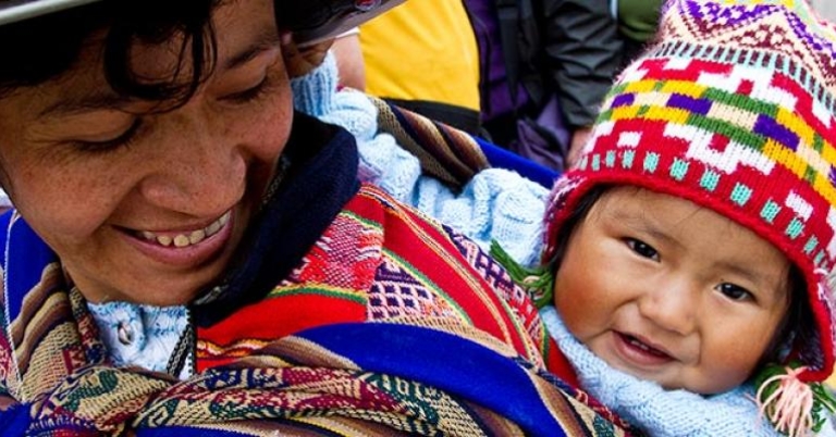 Mother and child dressed in Peruvian woven cloth