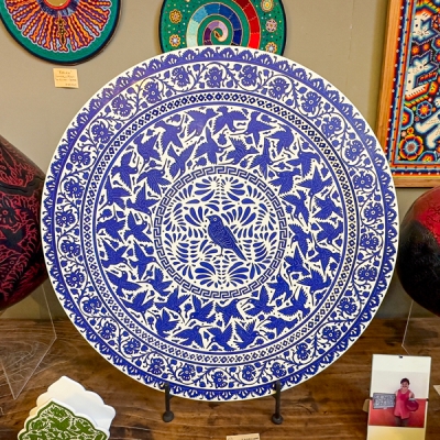 Intricate art on lacquered Gourds and a tray at Galería Atotonilco in San Miguel de Allende, Mexico