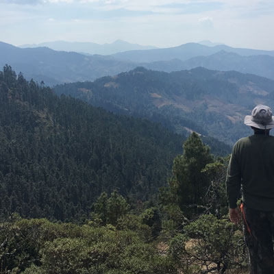 traveler looks out at mountain views