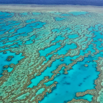 Aerial view of reefs in ocean water