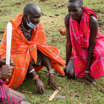 Maasai villagers making fire