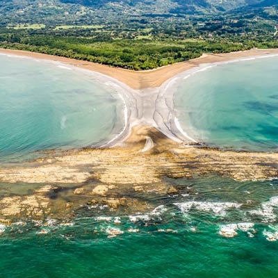 Aerial view of 'whale tail' beach at Marino Ballena National Park